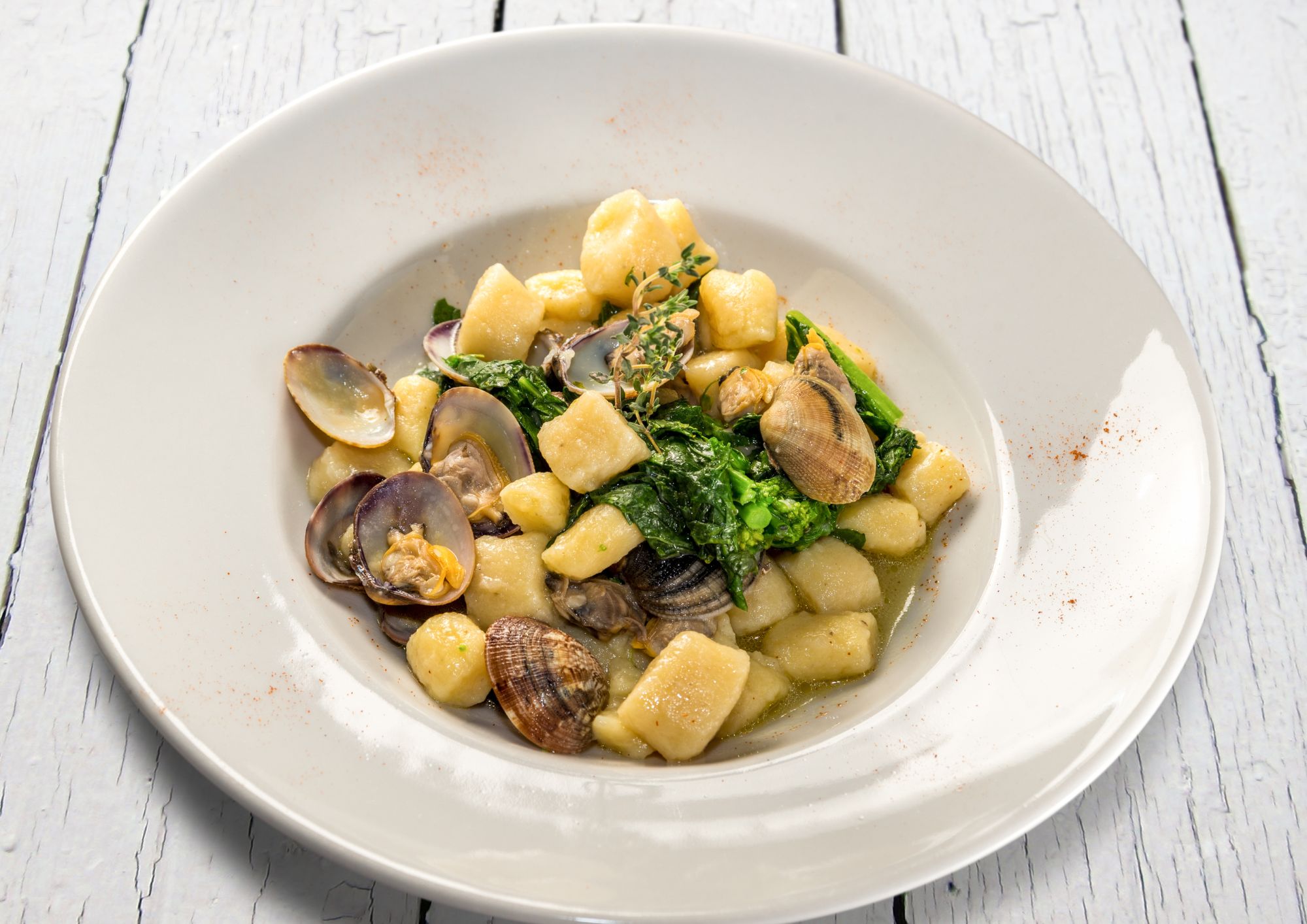 Levante potato gnocchi with clams and rapini 